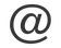 (at)